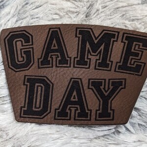 Game Day- leatherette faux leather material with heat activated adhesive