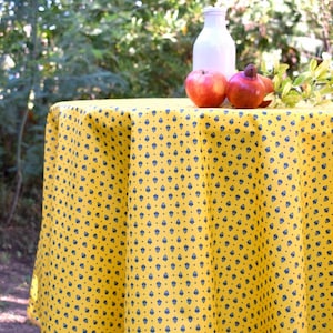 All-over yellow/blue Provençal coated cotton tablecloth