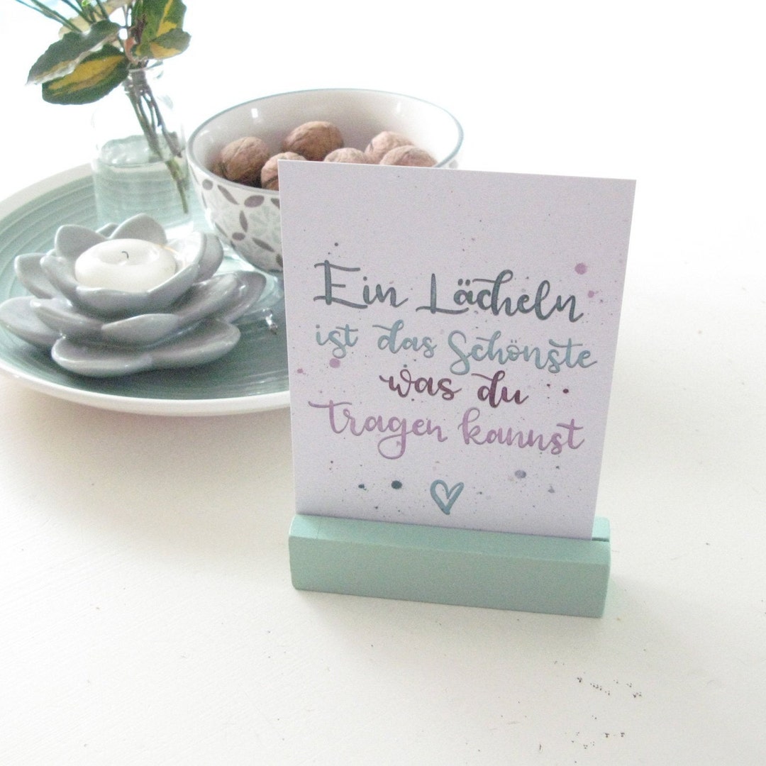 Postkarte "Ein Lächeln ist das Schönste was du tragen kannst