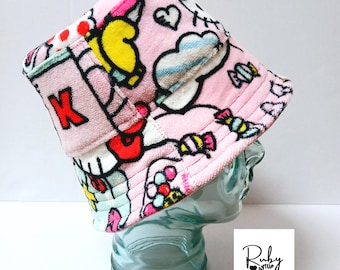 Geüpcycled strandhanddoekhoedje: festivalravehoed (56 cm)