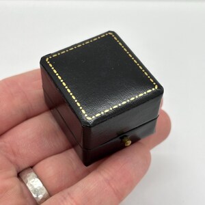 Vintage black ring gift box / presentation case with gold detailing and push button opening clasp - Cavendish Jewellers