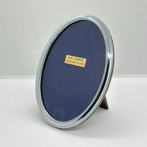 Vintage 140 x 100mm sterling silver fronted oval photo / picture frame on easel desk stand