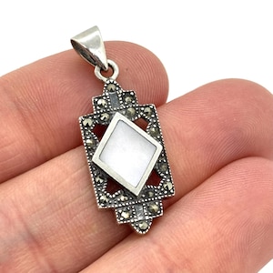 Vintage sterling silver Marcasite & mother of pearl inset pendant - art deco style