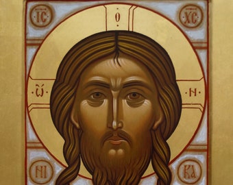 May include: A traditional religious icon depicting the face of Jesus Christ. The icon is painted in a realistic style with a golden background and a halo around the head. The inscription "IC XC" is visible on the top of the icon.
