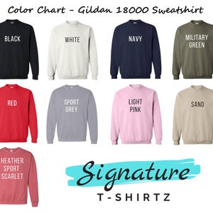 a group of sweaters with different sayings on them