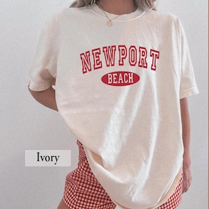 May include: A rustic wooden sign with the text "Welcome to our porch" in white lettering. The sign features a distressed finish and a simple, inviting design, perfect for outdoor decor.