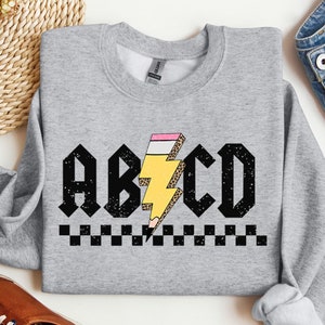 ABCD Lehrer Sweatshirt, Lehrer Rundhalsausschnitt, Lehrer Shirts, Lehrer Pullover, Schulanfang, Geschenk für Lehrer, Rock n Roll