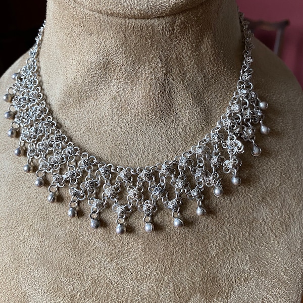 Silver bib necklace in Arabian style