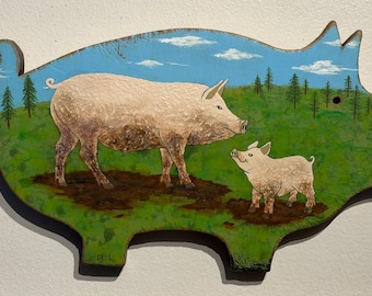 Antique cutting board with folk art pig painting