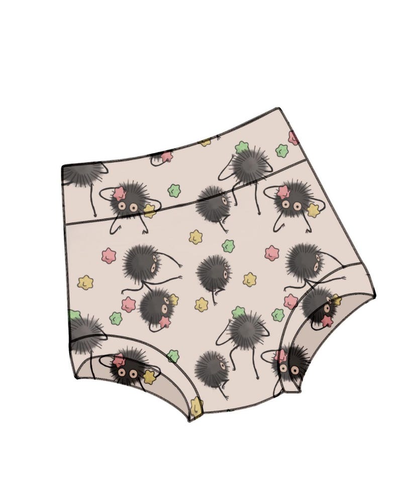 May include: Beige underwear with a black and white print of cartoon creatures with multiple eyes and a star pattern.