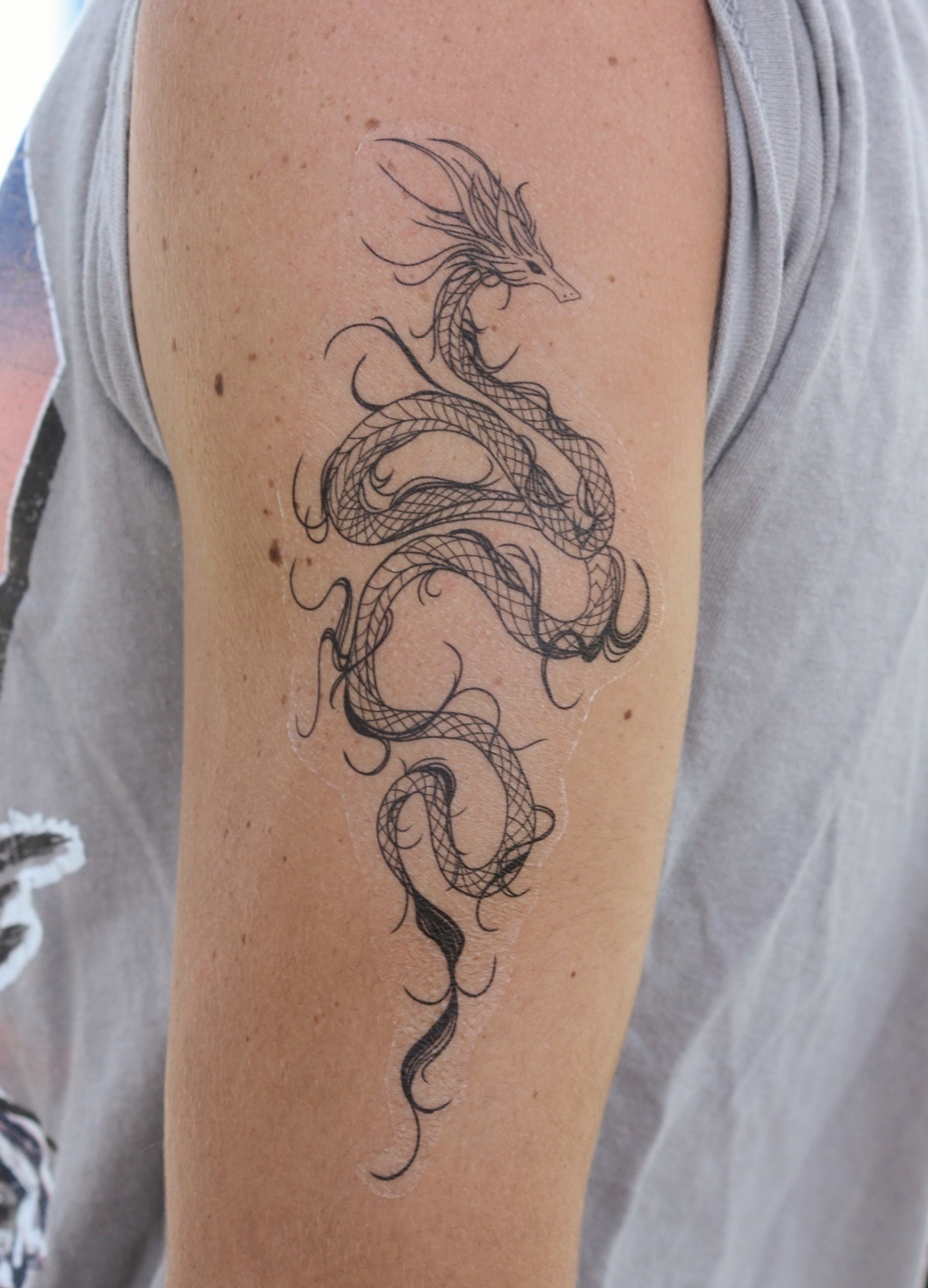 Khmer Dragon Tattoo