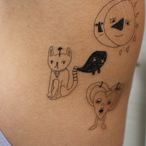 Tattoo uploaded by Tiffy Yuen  halloween cat kitty Ghost cute  catportrait animal animalportrait portait littletattoo smalltattoo   Tattoodo