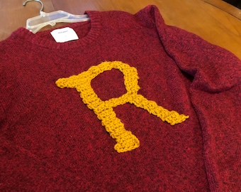 Sueter de fred retailers weasley