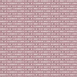 May include: A dusty rose pink fabric featuring a repeating white text pattern that reads WHAT A WONDERFUL WORLD in a sans-serif font. The text is arranged in horizontal rows across the entire surface, creating a consistent and uniform graphic design.