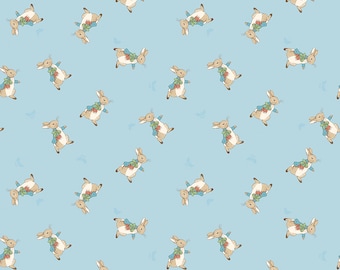 May include: A repeating pattern of brown rabbits holding carrots on a light blue background.