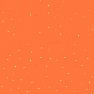 May include: A solid orange background with a scattered pattern of small white plus signs.
