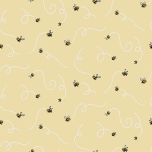 May include: A repeating pattern of cartoon bees with black and yellow stripes, flying along white curved lines, on a light yellow background. The bees are depicted with black outlines and small wings. The design has a whimsical, playful feel.
