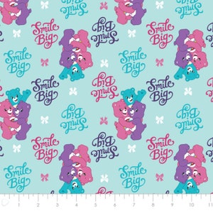 Care Bears Fabric by the Yard - Sparkle and Shine Smiles Blue - Camelot 44010305-2