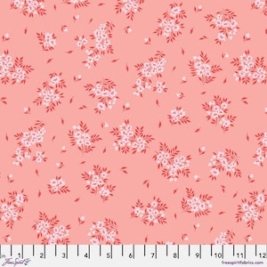 May include: A coral-colored fabric with a repeating pattern of white floral clusters and red leaves. The fabric is measured in inches, with a ruler along the bottom. The design is suitable for quilting, apparel, or home decor projects.