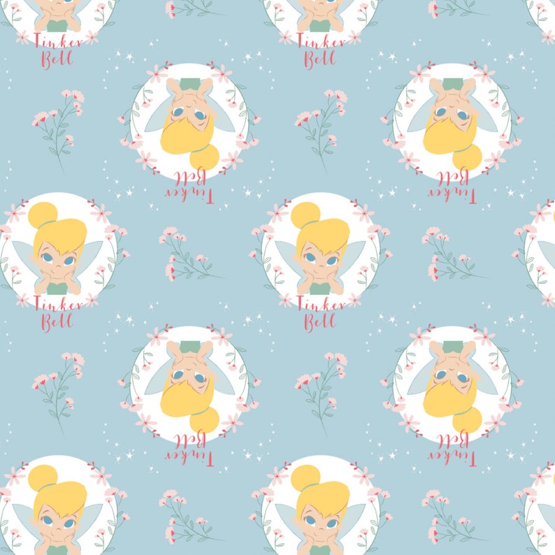 Camelot 85400303-2 Peter Pan Fabric by the Yard Tinker Bell Floral Badges Light Blue