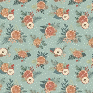 May include: A seamless pattern featuring a repeating design of dried orange slices, apples, and sprigs of greenery on a light blue background with white polka dots.