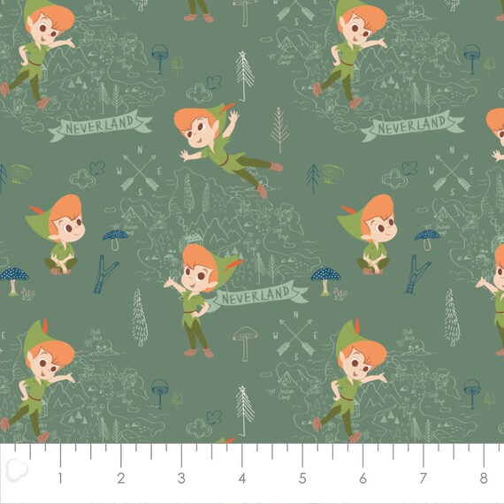 Camelot 85400303-2 Peter Pan Fabric by the Yard Tinker Bell Floral Badges Light Blue