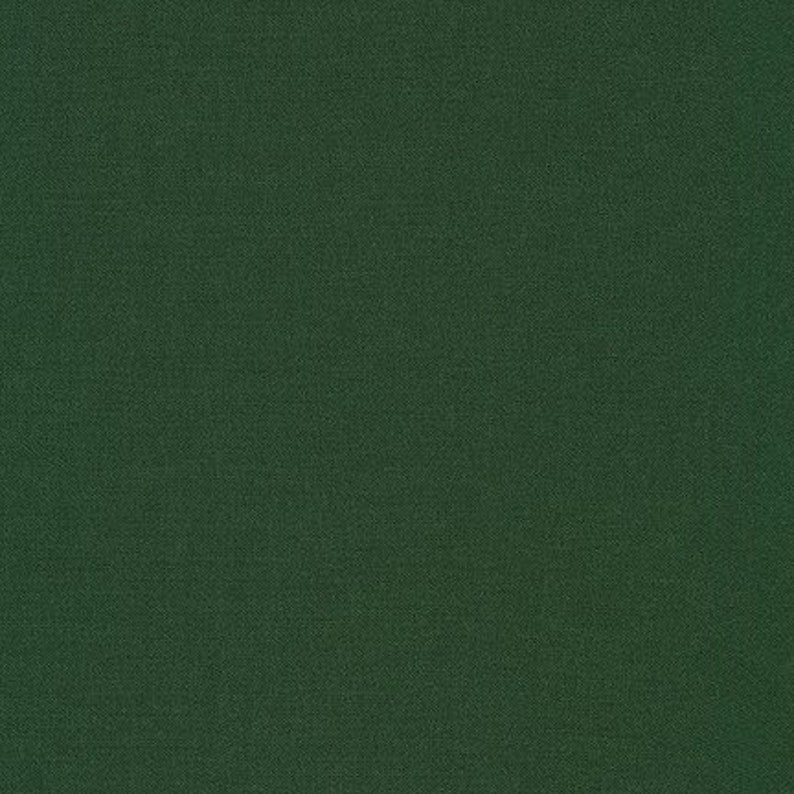 Puede incluir: Una muestra de tela verde s&oacute;lida. La tela tiene una textura sutil.
