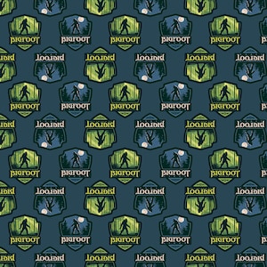 May include: A repeating pattern of a blue, green, and white illustration of a Bigfoot in the woods. The illustration is in a shield shape with the text "Bigfoot" and "Rivers" inside the shield.