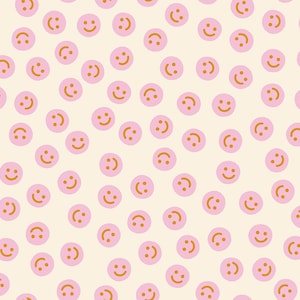 May include: A repeating pattern of pink smiley faces on a cream-colored background. Each smiley face has a simple, orange-colored mouth and eyes. The design is evenly distributed across the surface, creating a cheerful and playful aesthetic.