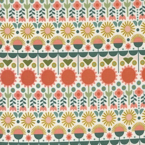 May include: A white fabric with a repeating pattern of green, pink, and yellow flowers. The pattern includes stylized flowers, leaves, and circles.