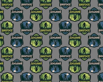 Bigfoot Cotton Fabric by the Yard - Legends of the National Parks Bigfoot Shields Gray - Riley Blake CD15062-GRAY