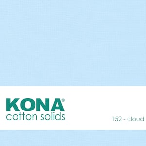 May include: KONA® cotton solids fabric swatch in the color Cloud, a light blue shade. The fabric is a solid color with a subtle texture.
