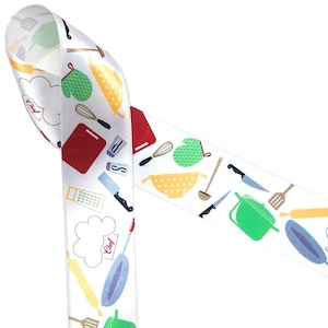 May include: White satin ribbon with a repeating pattern of kitchen utensils and the word "Chef" in red. The utensils include a rolling pin, a whisk, a spatula, a ladle, a colander, a knife, a grater, a pot, and a pan.