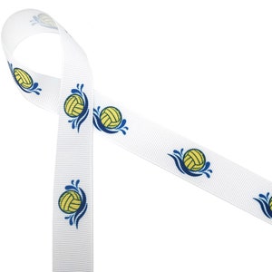 May include: White ribbon with a repeating pattern of yellow water polo balls with blue waves. The ribbon is folded in a loop.