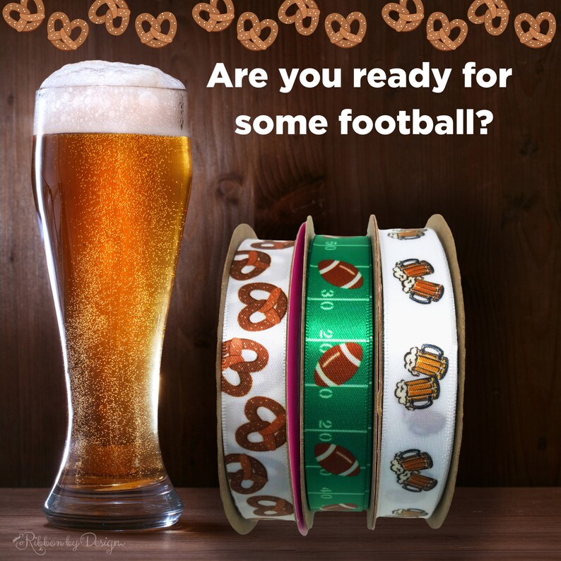May include: A tall glass of beer with foam, next to three spools of ribbon. The ribbons feature pretzel, football field, and beer mug designs. The text "Are you ready for some football?" is displayed.