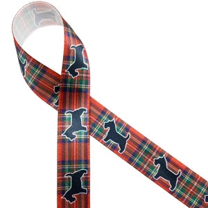 May include: A decorative ribbon featuring a classic plaid pattern in red, green, and blue. The ribbon is adorned with repeating black silhouette images of a dog. The ribbon is ideal for crafting and gift wrapping.