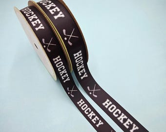 Hockey Ribbon in black an white offered on 5/8" and 7/8" single face satin