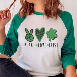 St Patricks Day Shirt Women Peace Love Irish Shirt Lucky Tee St Paddys Day Raglan Shirt Heart Shamrock Shirt St Patricks Day Shirt Nurse