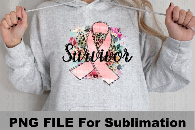 May include: A gray hoodie with a pink ribbon and floral design. The text "Survivor" is written in black cursive lettering.