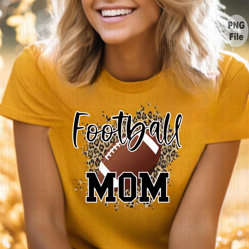 May include: A yellow t-shirt with a brown football and leopard print design. The text "Football Mom" is printed on the shirt.
