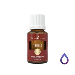 May include: A brown glass bottle with a white cap labeled "YOUNG LIVING" and "THIEVES" in gold lettering. The bottle contains 0.5 fl oz (15 ml) of 100% pure, therapeutic-grade essential oil blend.
