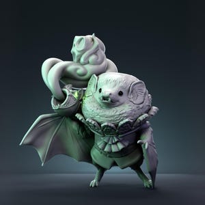 May include: A light green monochromatic figurine of a bat creature wearing a ruffled collar and vest. The bat holds a small, toothy, spherical object with a swirling, cloud-like top. The figure has large ears, small fangs, and wings.