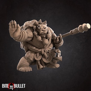 Peut inclure: Figurine beige d'une créature fantastique, peut-être un humanoïde ressemblant à une tortue, tenant un bâton. La figurine est dans une pose dynamique, un bras levé. La figurine présente des détails complexes, notamment des vêtements et des accessoires. Le logo "Bite the Bullet" est en bas.