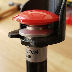 Grotere duimstop met knop