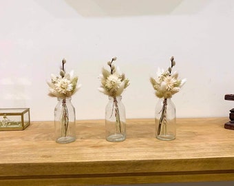 Trio of bouquets of dried flowers