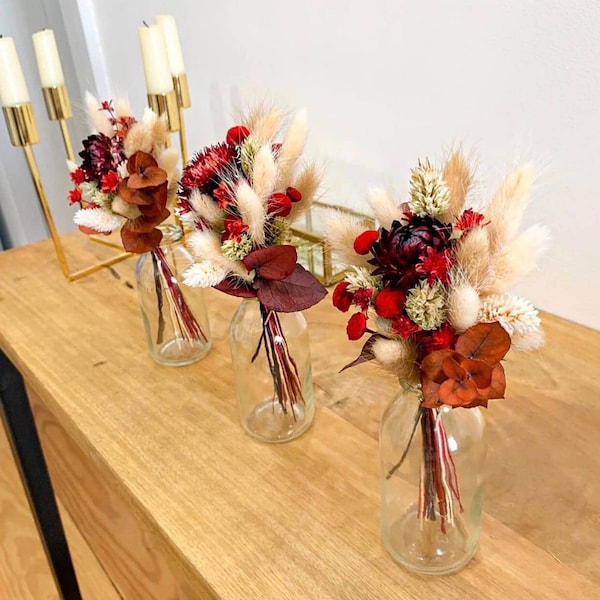 Trio of dried flower bouquets with soliflores