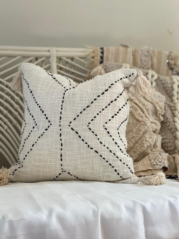 White mudcloth pillow 2025