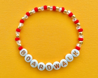 Pulseira de contas de calçadão de boas-vindas