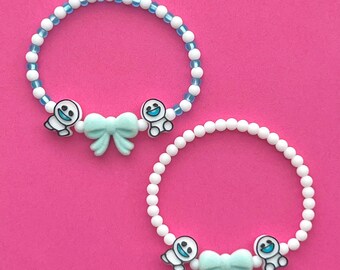 Weisses Gefrorenes Snowgie Bow Perlen Armband