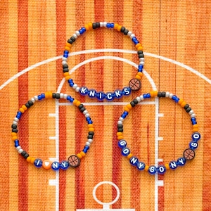 New York Knicks basketmästerskap 2026 pärlarmband